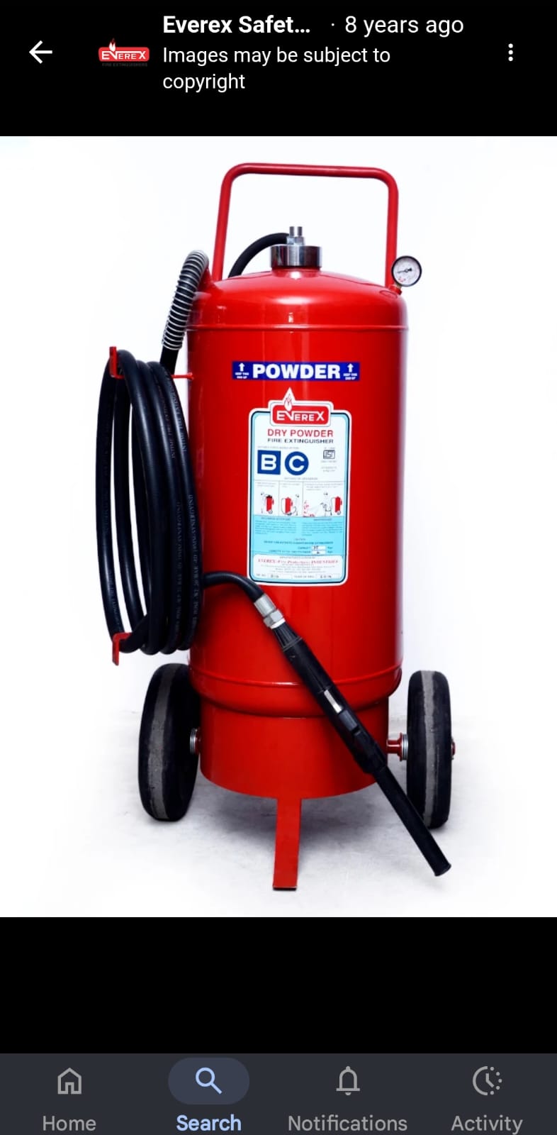 Everex Carbon Dioxide Fire Extinguisher with operation labels